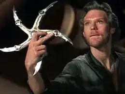 still from *Krull* showing protagonist exhibiting ***the Glaive***