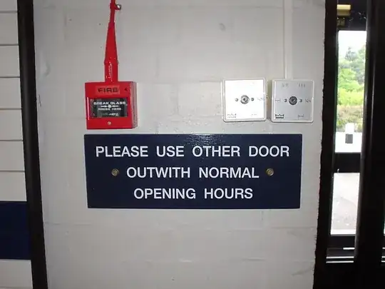 sign on door reading "please use other door outwith normal opening hours"
