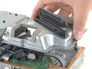 Abschirmplatte und Elastikband entfernen