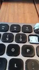 The key cap should be lifted from the top edge. You can use any "tool" that allows you to get under the top edge, and lift the edge away. Something flat and relatively thin will do (like a small flat-head screw driver). In this video I am using some <a href="../../home/unavailable_offline?url=/products/tweezers" class="product-link">tweezers</a>.