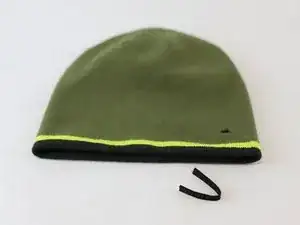 Eine kaputte Etikettenschlaufe reparieren