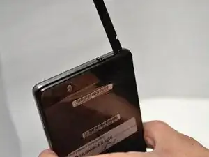 Rückenabdeckung und Lautsprecher entfernen