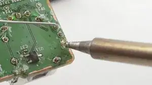 Solder one of the pins to the circuit board.