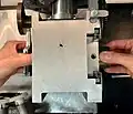 14. Withdraw the barrel and cylinder assembly from the sliding block.
