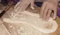 12. Flatten the dough rope slightly