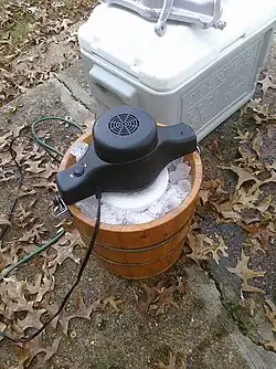 Electrically-powered machine chilled with ice and salt