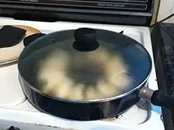 Step 11: Steam the pot stickers, covered, until the water cooks away (5–10 minutes)