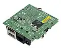 The bottom of the motherboard contains a Kingston flash storage chip.[3]