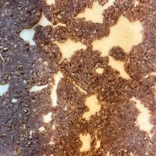 The nut paste has been partially spread.