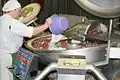 Step 1a: The meat and ingredients are put inside the mixer