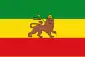 A green, gold, and red vertical tricolor with a lion in the center