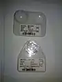Intraoccular lenses in their cases
