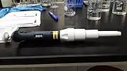 A 5,000 μL (5 mL) pipette, with the volume to be transferred indicated. 500 means that the amount transferred is 5,000 μL.