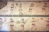 This mosaic, called the Coronation of the Winner and nicknamed the bikini girls, shows Roman women engaged in athletic activities such as swinging a discus, hitting a ball to each other, and stepping whilst using dumbbells. Villa Romana del Casale, 4th century AD.