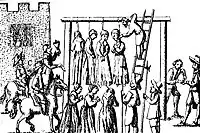 An image of suspected witches being hanged in England, published in 1655