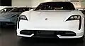 front air intakes improve aerodynamics by guiding the incoming air over the wheels, reducing turbulence