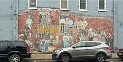 This Mural depicts some of the Ojibwe people that helped build the Mable Tainter Theater in Menomonie, Wisconsin.