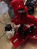 Opened up the base and took all three motor out so that the cables would be long enough with the new addition