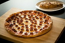 A pizza and a calzone