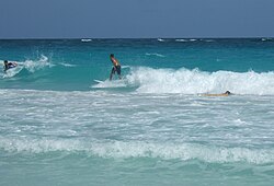 Surfing on the Crane beach requires patience, timing, skill and fitness of the participating locals.